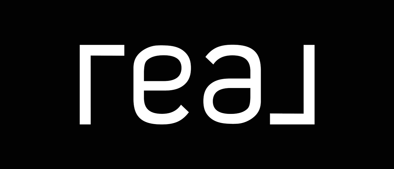 Real Logo Knockout Black with White Wordmark (1)